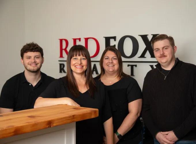 Red Fox Realty real estate agents team.